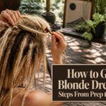 A model showcasing beautifully styled blonde dreads in natural light.